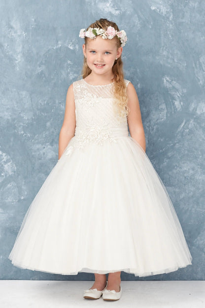 Full tulle skirt on an off-white flower girl dress.