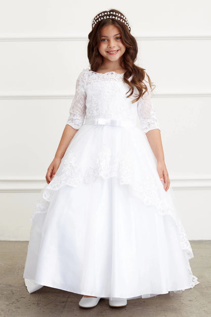 Three-quarter lace sleeves frame a white flower girl dress.