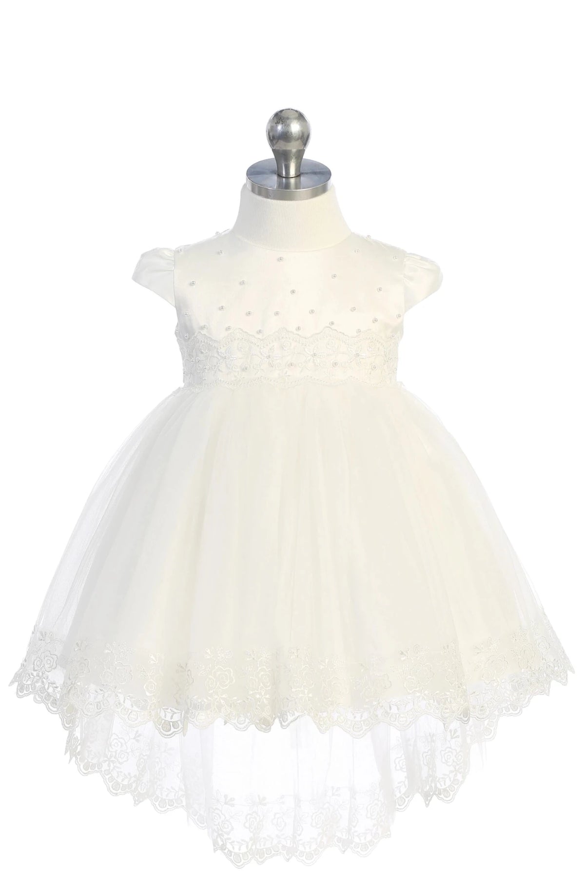 Ivory christening dress with cap-sleeved satin bodice with pearls.