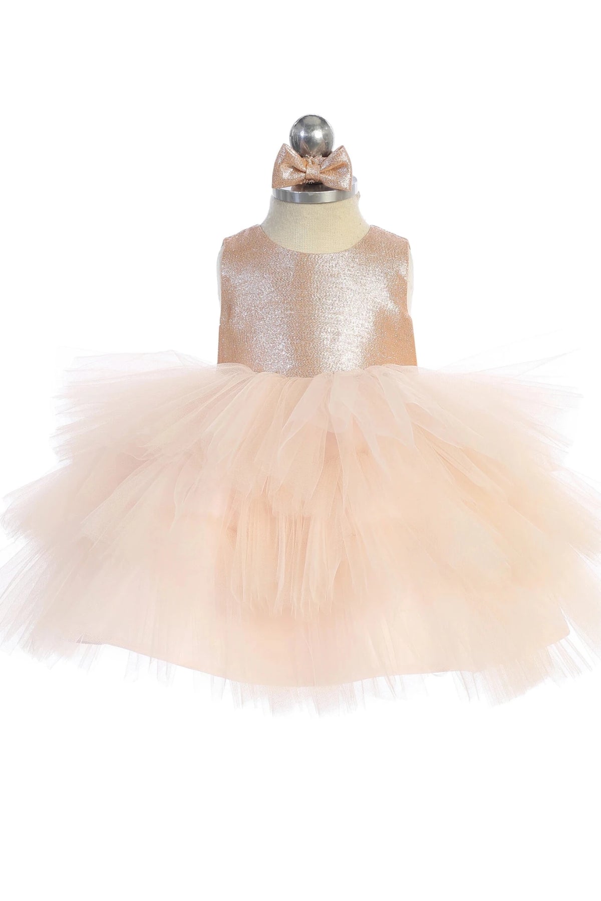 Focus on a glittered sleeveless bodice of the rose gold flower girl dress.