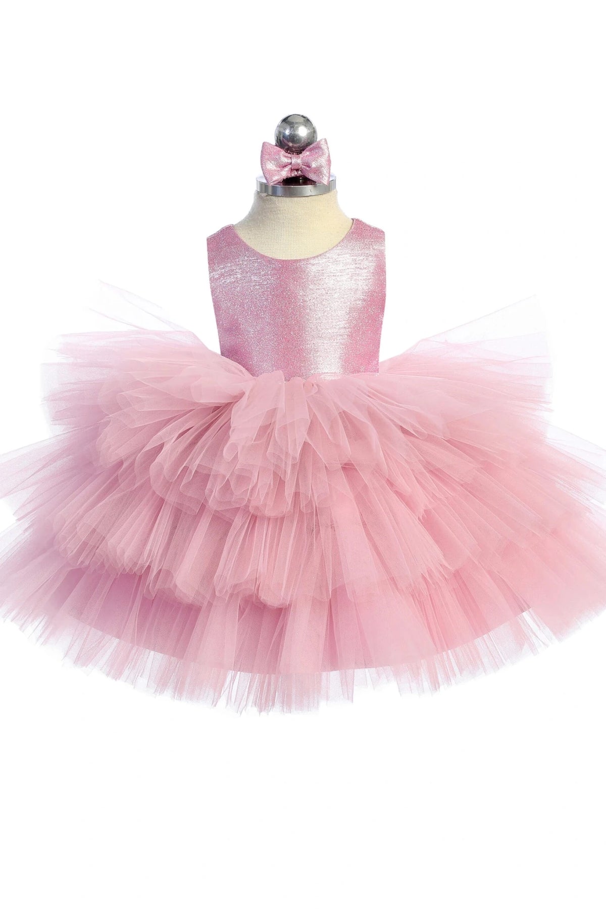 Featuring a layered mesh skirt, a violet pink flower girl dress.