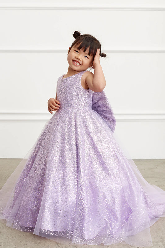 Lilac kids pageant dress featuring a full glitter skirt.