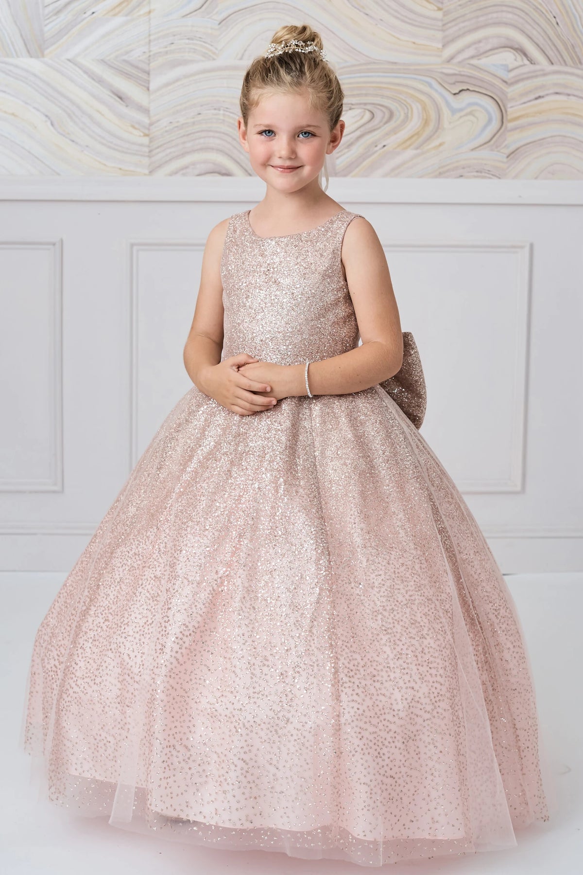 Rose Gold kids pageant dress featuring a full glitter skirt.