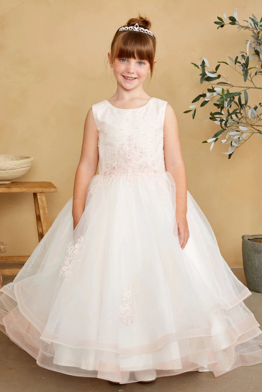 In view: floral bodice embroidery of a blush flower girl dress.