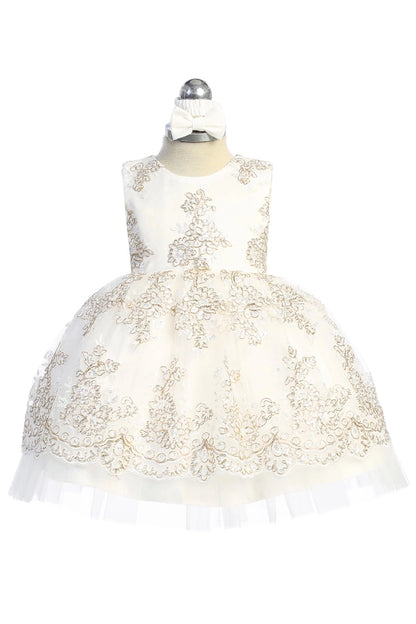 A view of a beaded lace bodice on the off-white flower girl dress.