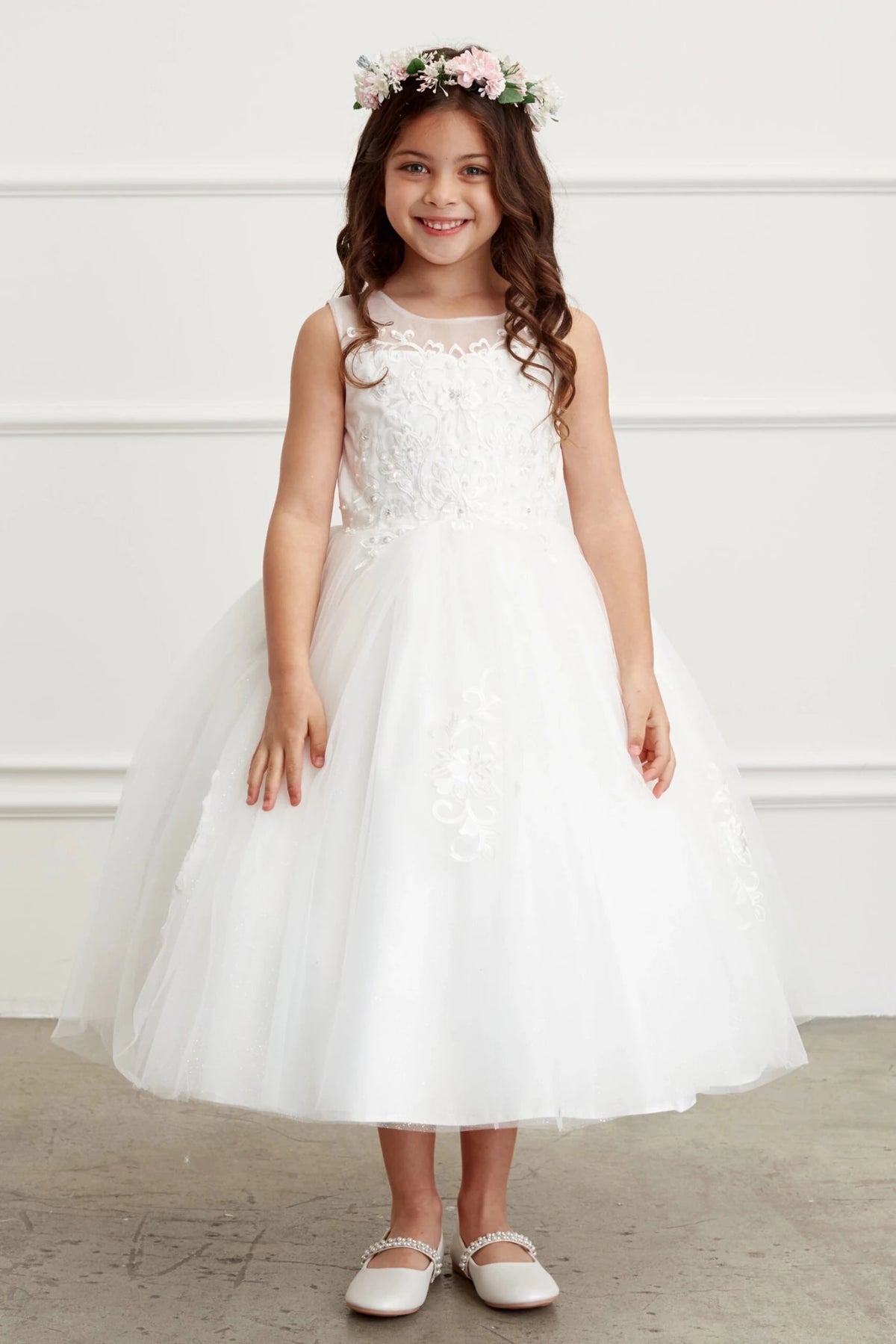 Off-White flower girl dress with a pearl beaded bodice.