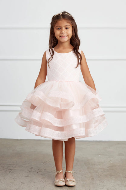Visible details on the Blush kids pageant dress include a short tiered mesh skirt.