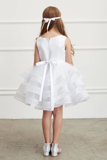 The White kids pageant dress has a tied sash across the back waist.