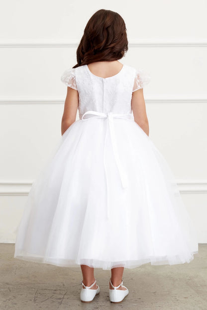 Behind the waist, an off-white flower girl dress has a narrow tied bow.