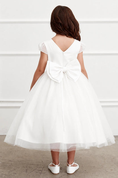 large satin back bow of an off-white flower girl tulle dress. cap sleeves