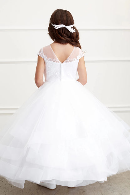 In view: a satin back bow of a white flower girl dress.