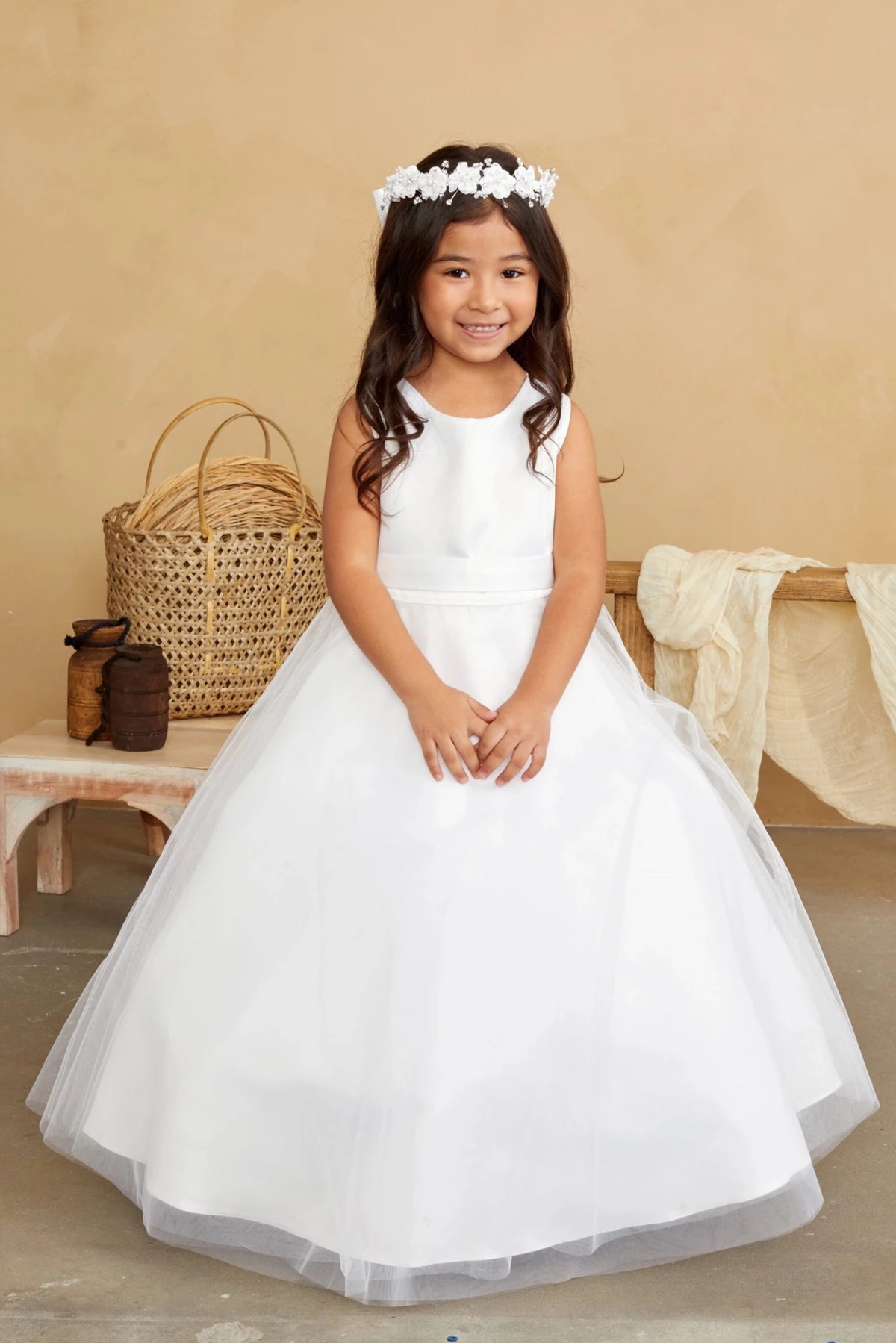 Simple satin waist trim circles this off-white flower girl dress.