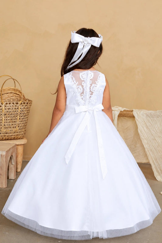 Back embroidery frames a sheer center panel on the white flower girl dress.