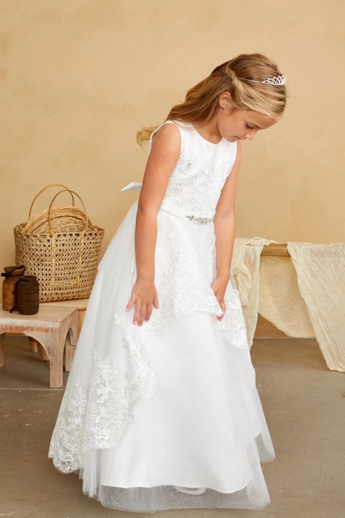 Side view of the ivory sequin lace with a tulle peplum flower girl dress.