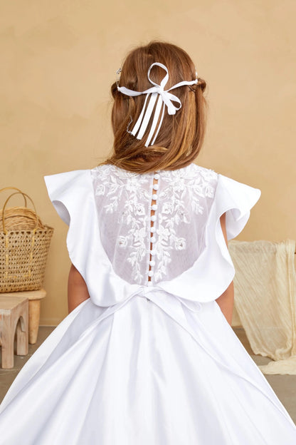 White flower girl dress, showing embroidered button back.