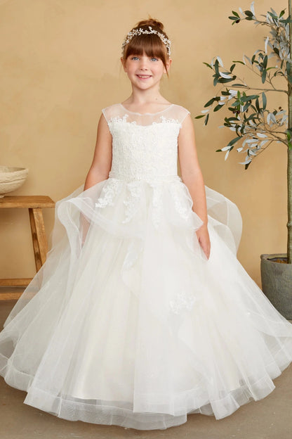 Floral appliques follow the off-white flower girl dress's folded overskirt.