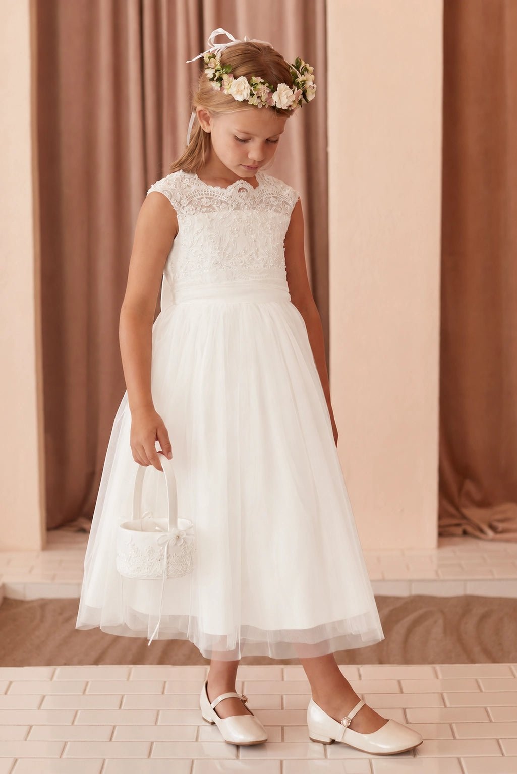Off-White flower girl dress featuring a pleated waist sash.