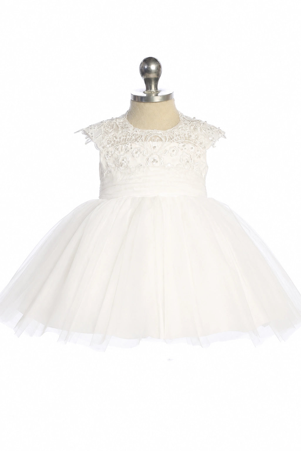 Shown here, an off-white flower girl dress with a floral lace bodice.