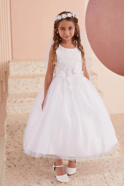 Detailed with a full tulle skirt, this white flower girl dress.