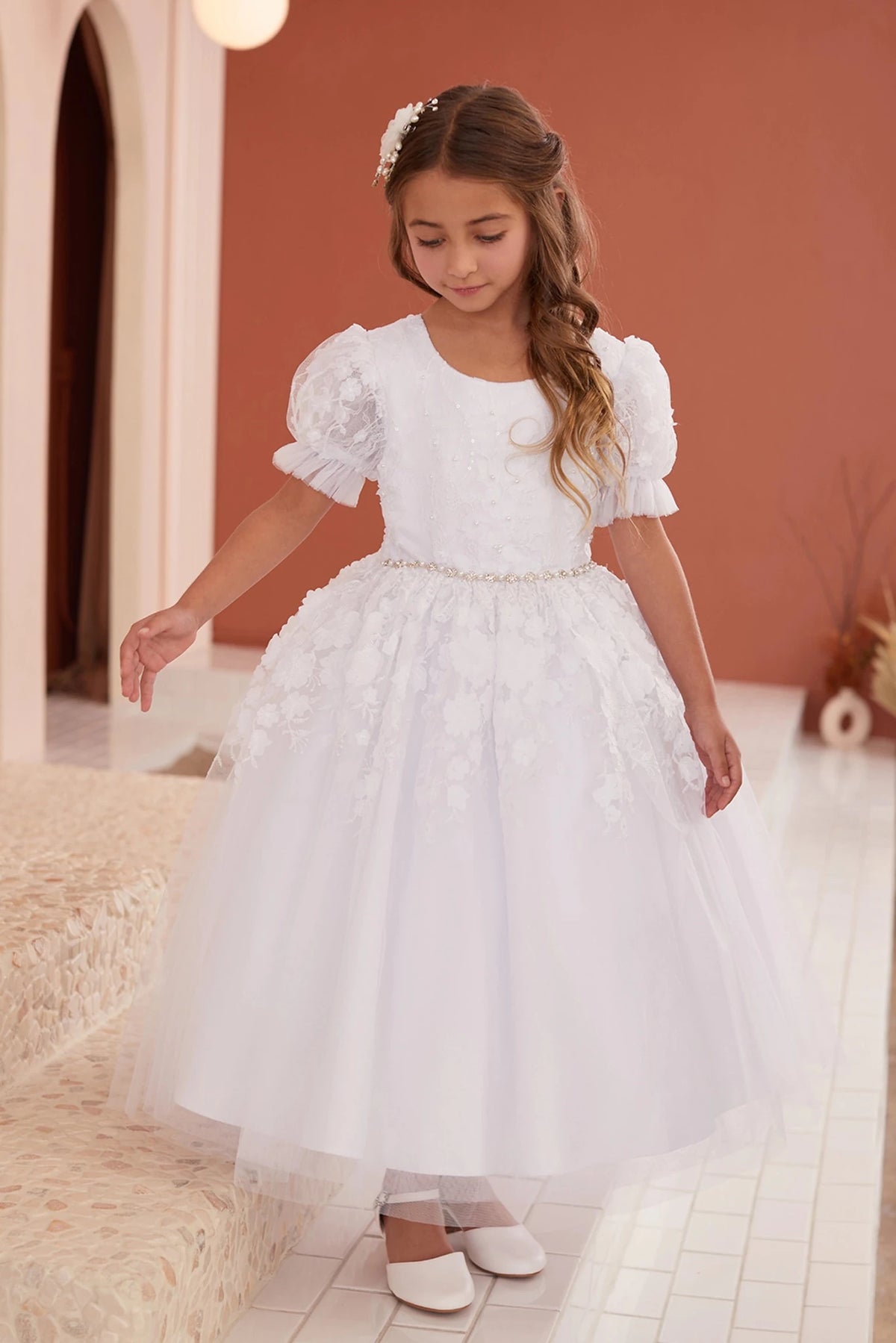 Visible on the white flower girl dress: puffed floral sleeves.