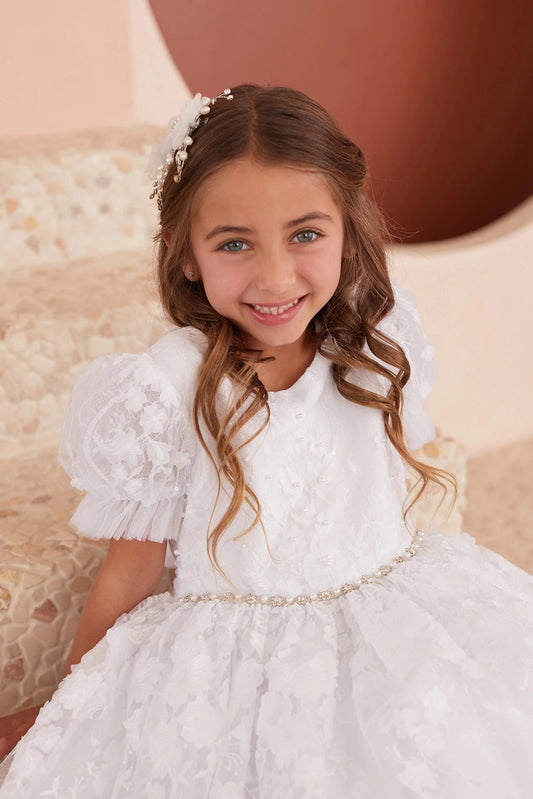 Ruffled lace sleeve shown on the white flower girl dress.