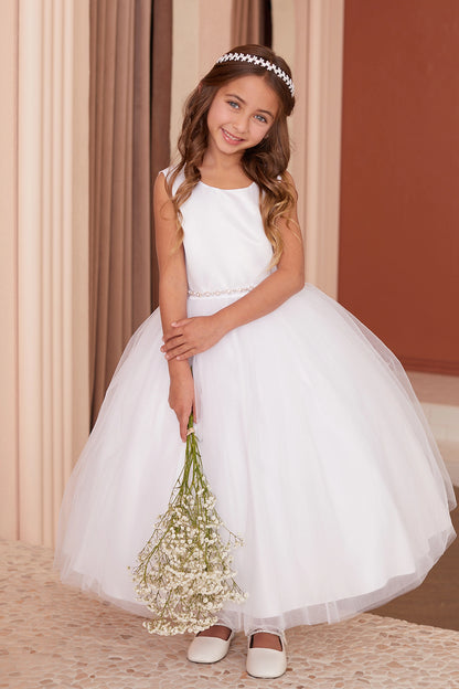 A view of a smooth sleeveless bodice on the white flower girl dress.