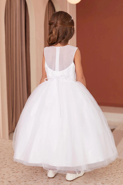 Detailed with sheer pearl back, this white flower girl dress.