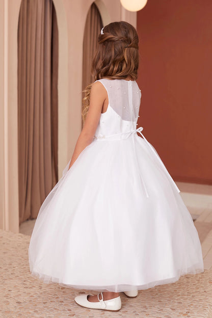 Defined by a slender satin sash, this white flower girl dress.