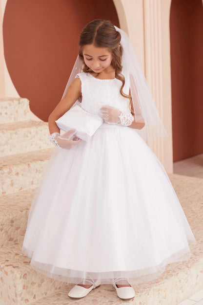 White flower girl dress with a full tulle skirt.