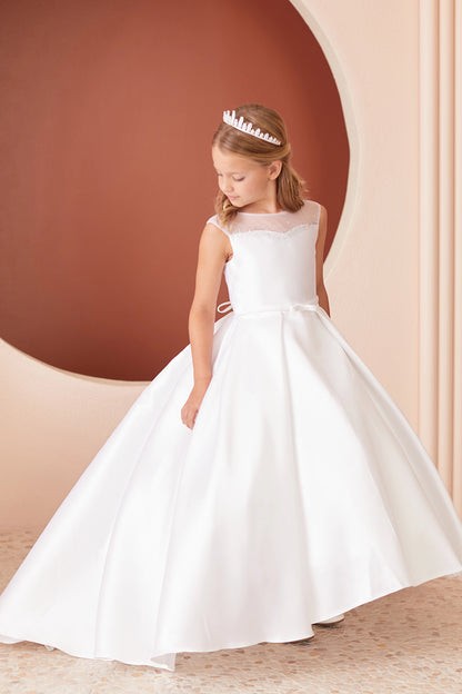 Highlighting crisp waist pleats on a white flower girl dress.