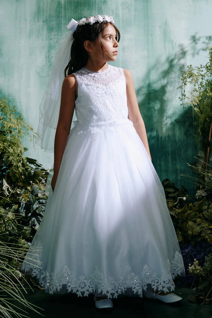 Highlighting floral skirt edging on a white flower girl dress.