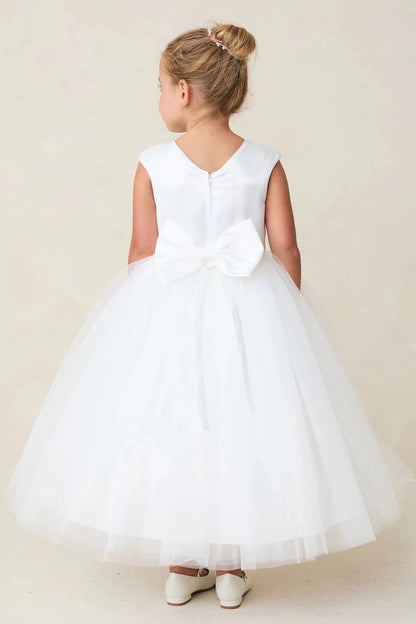 Below a V neckline, the off-white flower girl dress has a smooth satin back.