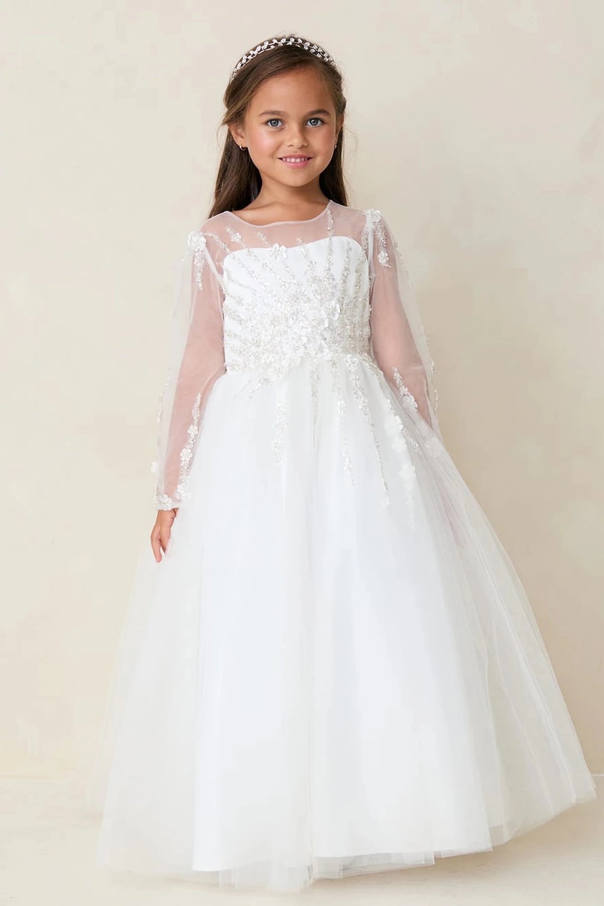 Defined by long embroidered sleeves, this off-white flower girl dress.