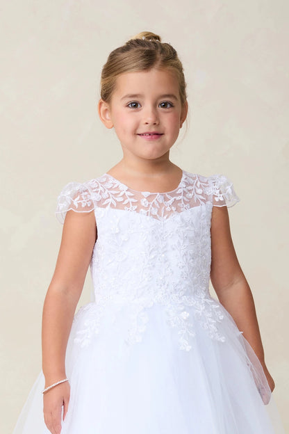 This white flower girl dress displays a lace-trimmed neckline.
