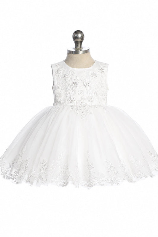 Floral skirt border: detail of the off-white flower girl dress.