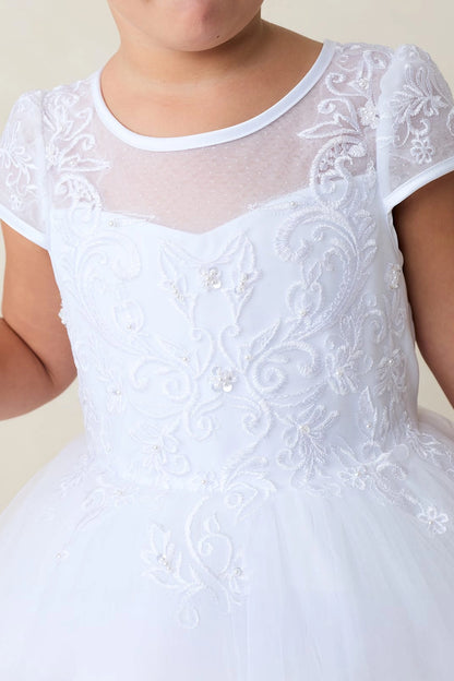 In view: swirling bodice embroidery of a white flower girl dress.