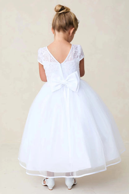 Highlighting V-shaped back on a white flower girl dress.