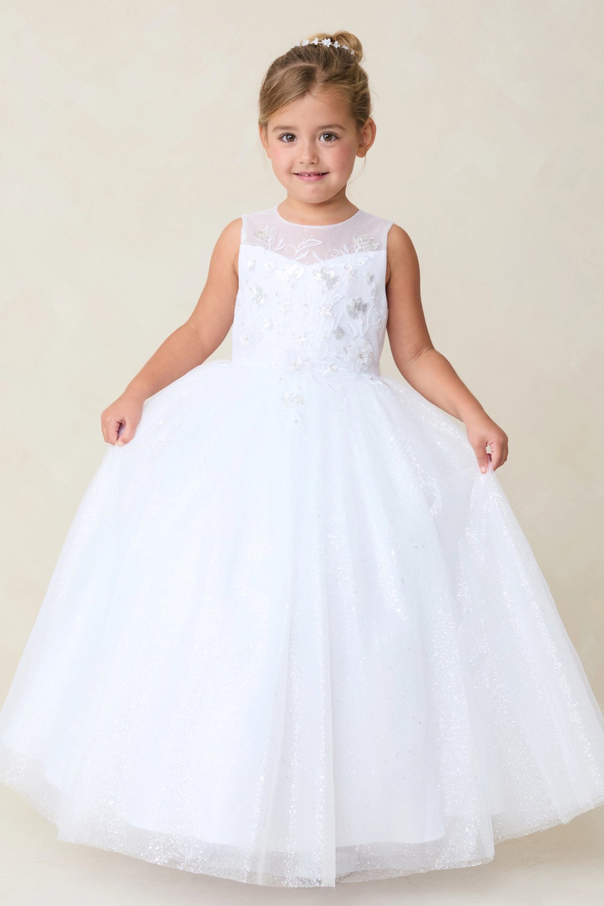 Focus on an embroidered flower bodice of the white flower girl dress.
