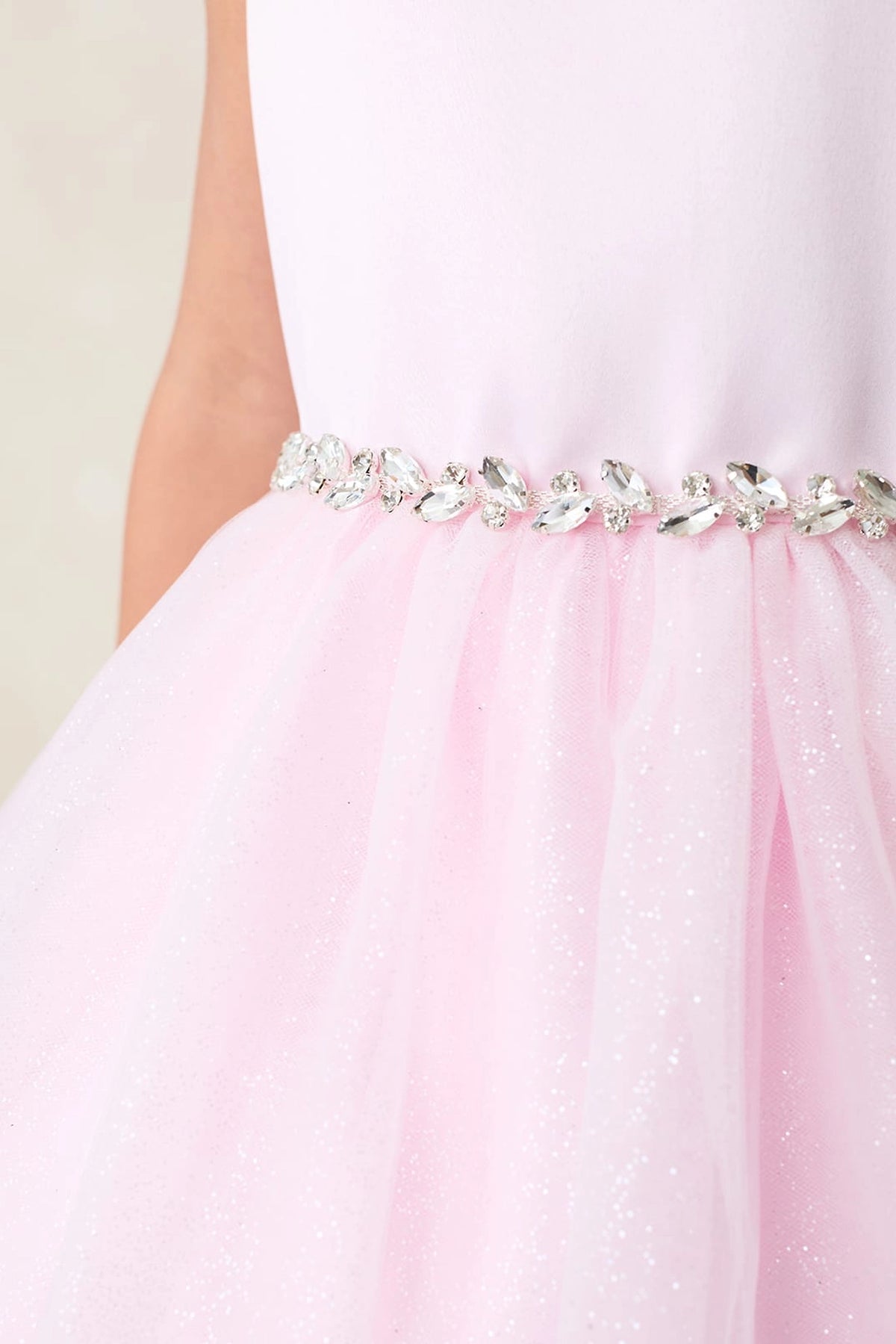 Visible details on the Pink kids pageant dress include rhinestones along the satin waist.