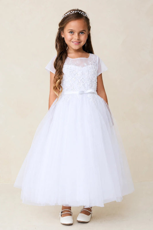 White flower girl dress, showing a full tulle skirt.
