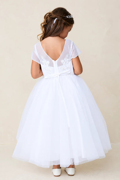 Focus on a slender back sash of the white flower girl dress.