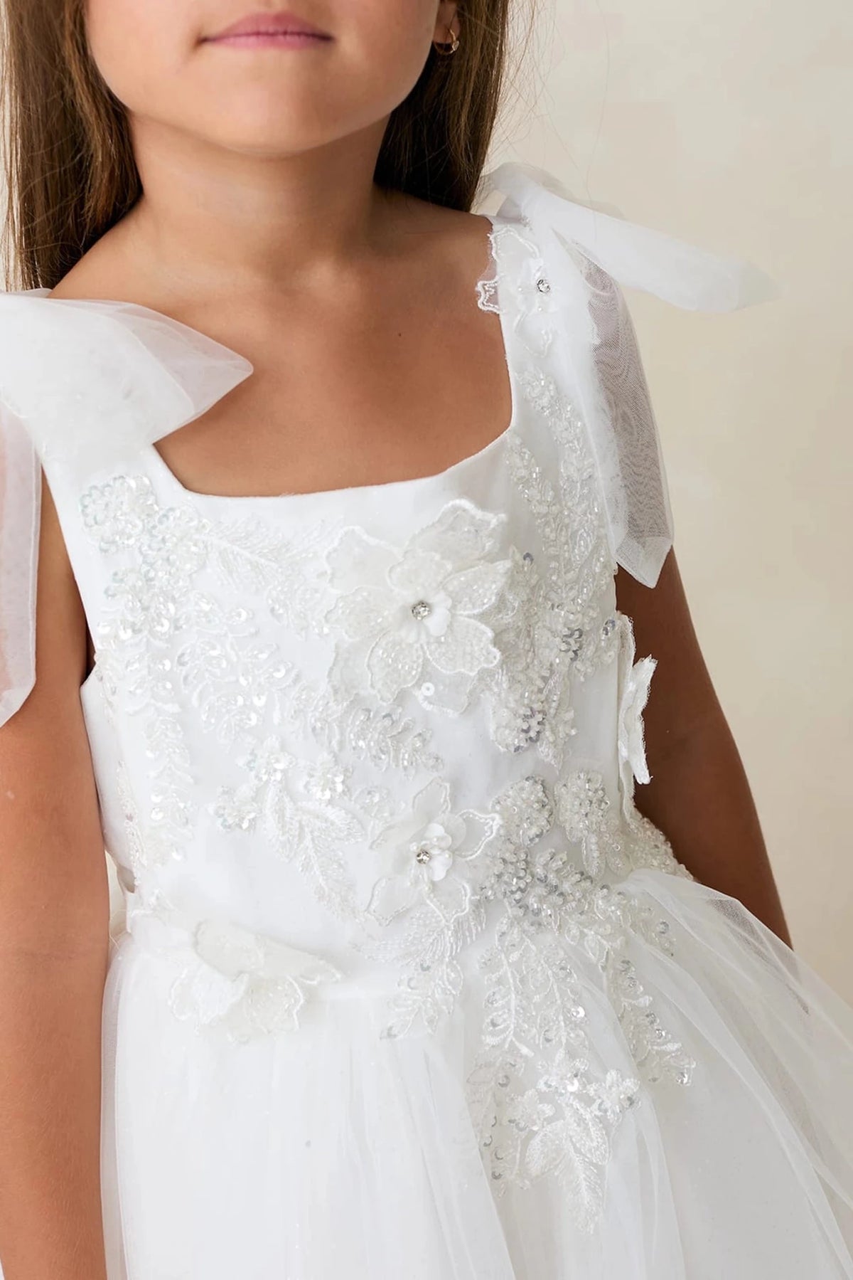 Off-White flower girl dress, showing a flower applique bodice.