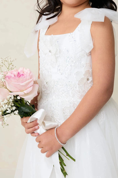 Detailed with layered bodice flowers, this off-white flower girl dress.