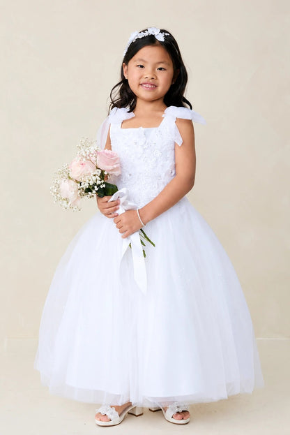 With a 3D flower bodice, a white flower girl dress.