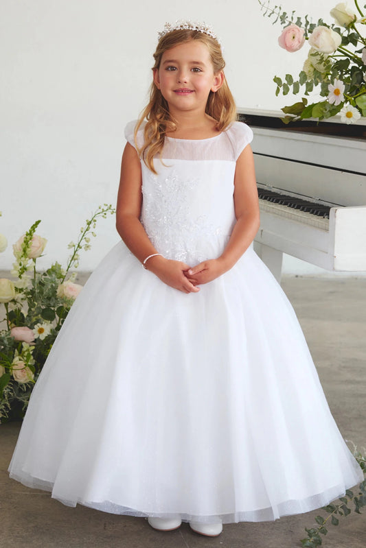 Emphasis on a floral shoulder band of the white flower girl dress.