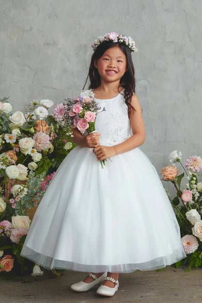 Detailed with a gathered skirt, this white flower girl dress.