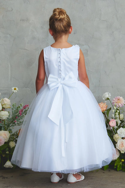 Shown here, a white flower girl dress with a back waist bow.