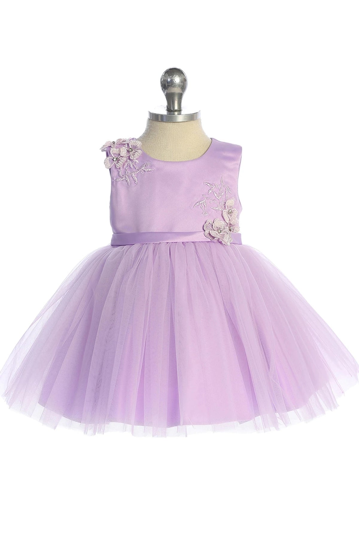 Lilac flower girl dress detailed with flower bodice accents.