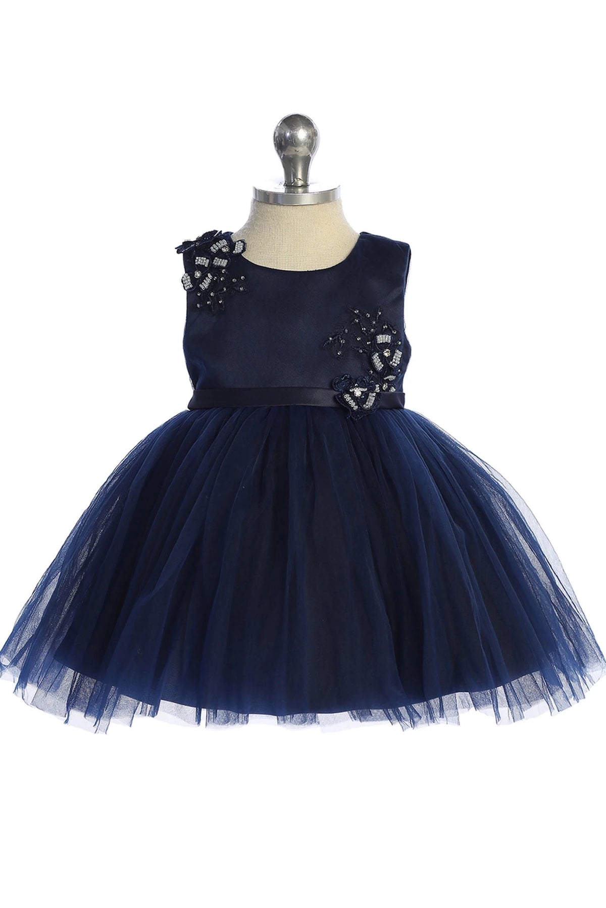 3D flower shoulder shown on the navy blue flower girl dress.