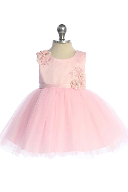 In view: flower waist appliques of a pink flower girl dress.